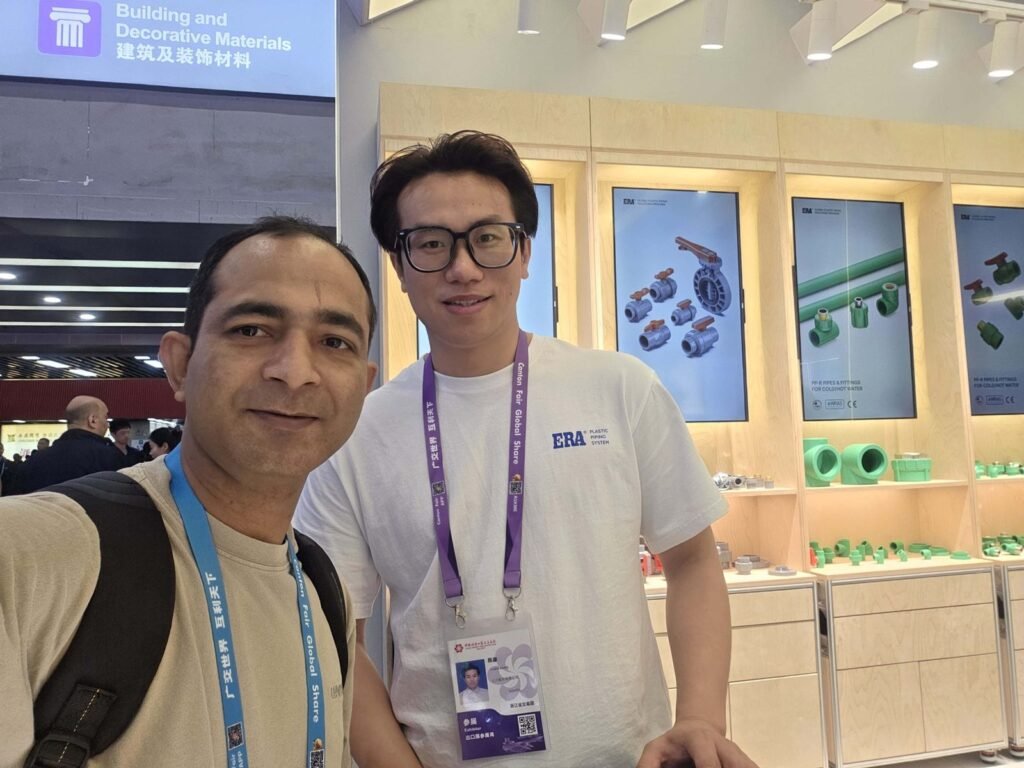 Max with the ERA Plastic Piping team in the Building and Decorative Materials hall at the Canton Fair, Guangzhou